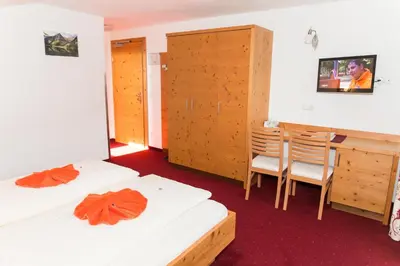 Ein Bett oder Betten in einem Zimmer der Unterkunft Landgasthof Alpenblick