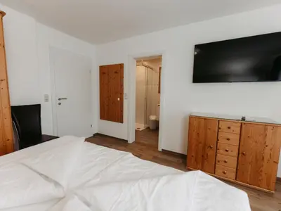 Ein Bett oder Betten in einem Zimmer der Unterkunft Apartment Rosi-1 by Interhome