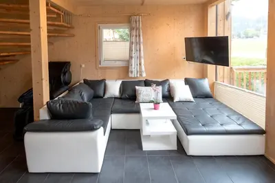 Ein Sitzbereich in der Unterkunft Aron Chalet Kreischberg 10A