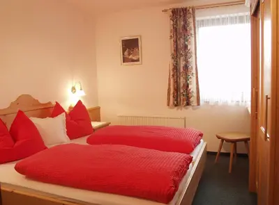 Ein Bett oder Betten in einem Zimmer der Unterkunft Haus Elfi