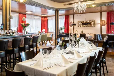 Ein Restaurant oder anderes Speiselokal in der Unterkunft Gasthof Eckberg