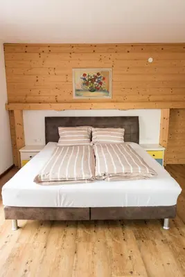 Ein Bett oder Betten in einem Zimmer der Unterkunft Haus Steger