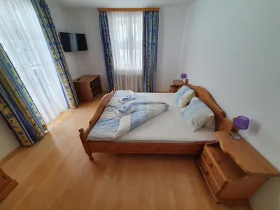 Ein Bett oder Betten in einem Zimmer der Unterkunft Haus Schattau