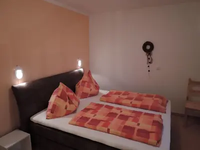 Ein Bett oder Betten in einem Zimmer der Unterkunft Haus Pfeiffenberger