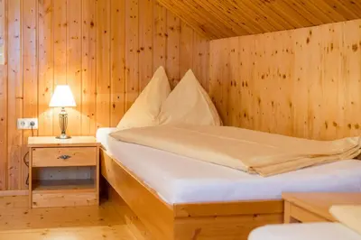 Ein Bett oder Betten in einem Zimmer der Unterkunft Kolping-Ferienhaus