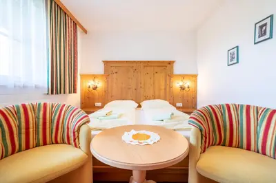 Ein Bett oder Betten in einem Zimmer der Unterkunft Feriengut Fingerhof