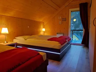 Ein Bett oder Betten in einem Zimmer der Unterkunft Wohlfühl Chalet Alpenglöckchen