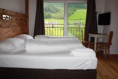 Ein Bett oder Betten in einem Zimmer der Unterkunft SonnenChalet Werfenweng