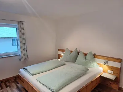 Ein Bett oder Betten in einem Zimmer der Unterkunft Haus Untermühle