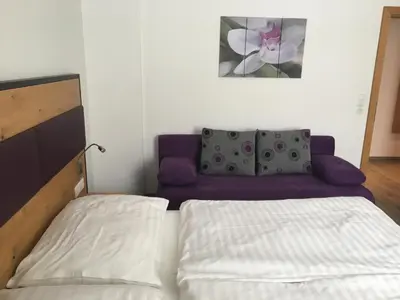 Ein Bett oder Betten in einem Zimmer der Unterkunft Haus Amade