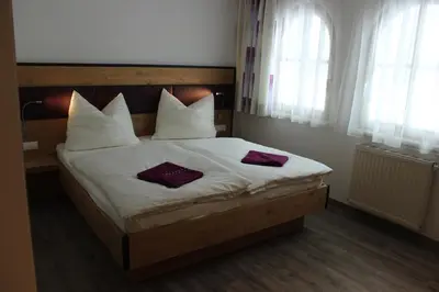 Ein Bett oder Betten in einem Zimmer der Unterkunft Haus Amade