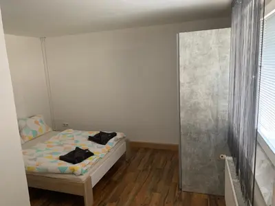 Ein Bett oder Betten in einem Zimmer der Unterkunft Nexi s Appartement an der Enns 9