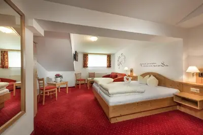 Ein Bett oder Betten in einem Zimmer der Unterkunft Das Wismeyer - Skihotel an der Plattenkarbahn