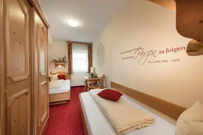 Ein Bett oder Betten in einem Zimmer der Unterkunft Das Wismeyer - Skihotel an der Plattenkarbahn