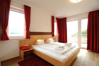 Ein Bett oder Betten in einem Zimmer der Unterkunft Penthouse Alpine Living direkt an der Skipiste by Schladmingurlaub