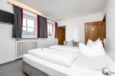Ein Bett oder Betten in einem Zimmer der Unterkunft Haus Deutinger