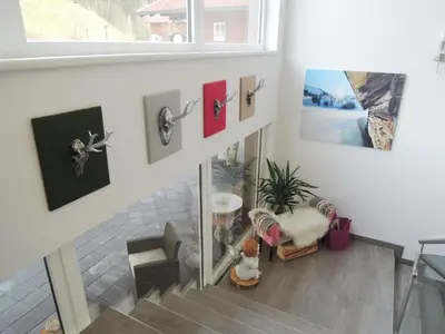Ein Sitzbereich in der Unterkunft Appartements Zahnleiten