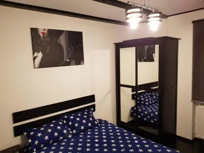 Ein Bett oder Betten in einem Zimmer der Unterkunft Sweet Apartment