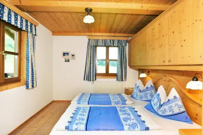 Ein Bett oder Betten in einem Zimmer der Unterkunft Steinbachgut