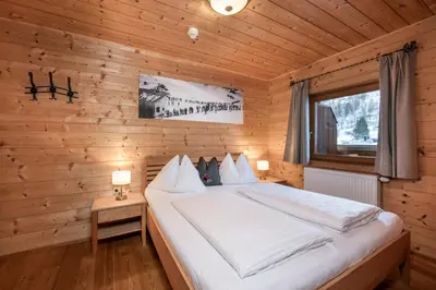 Ein Bett oder Betten in einem Zimmer der Unterkunft AUSTRIA APPART - natural Lifestyle Appartements auf der Piste