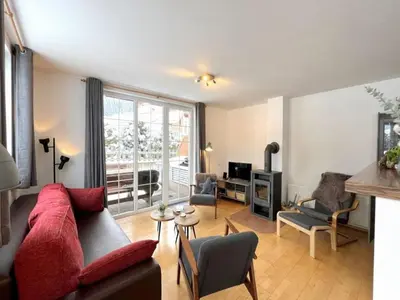 Ein Sitzbereich in der Unterkunft Apartment by the ski slope