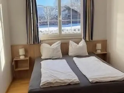 Ein Bett oder Betten in einem Zimmer der Unterkunft Apartment by the ski slope
