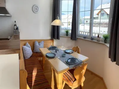 Ein Sitzbereich in der Unterkunft Apartment by the ski slope
