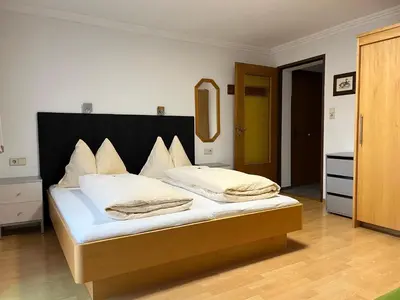 Ein Bett oder Betten in einem Zimmer der Unterkunft Haus Ortsblick