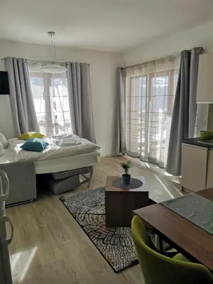Ein Bett oder Betten in einem Zimmer der Unterkunft Schneekristall