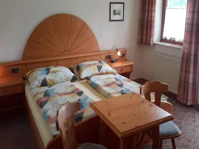 Ein Bett oder Betten in einem Zimmer der Unterkunft Geräumige Unterkunft in Schladming mit Sauna