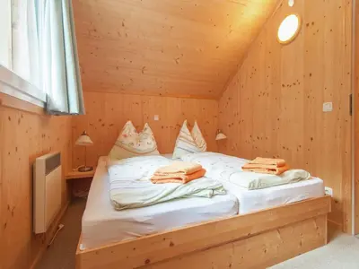 Ein Bett oder Betten in einem Zimmer der Unterkunft Chalet in Stadl nahe Kreischberg Pisten