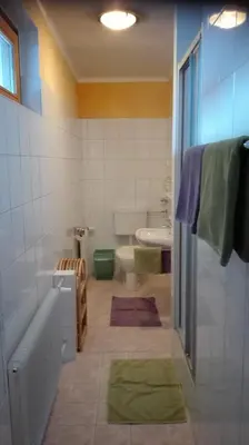 Ein Badezimmer in der Unterkunft Pension Restaurant Meran