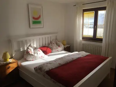 Ein Bett oder Betten in einem Zimmer der Unterkunft Ferienwohnung Meindl Elfi An der Drachenwand 44