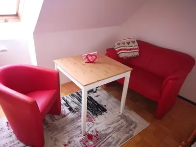 Ein Sitzbereich in der Unterkunft Haus Elsasser