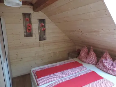 Ein Bett oder Betten in einem Zimmer der Unterkunft Unterlanschützhof