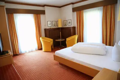 Ein Bett oder Betten in einem Zimmer der Unterkunft Seegasthof Hois'n Wirt - Hotel mit Wellnessbereich