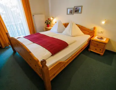 Ein Bett oder Betten in einem Zimmer der Unterkunft Haus Winkler