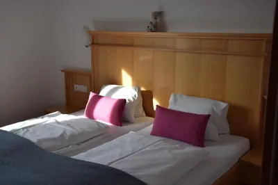 Ein Bett oder Betten in einem Zimmer der Unterkunft Ferienwohnungen Ellmer