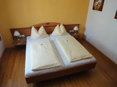Ein Bett oder Betten in einem Zimmer der Unterkunft Appartementhaus Maria