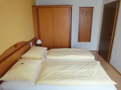 Ein Bett oder Betten in einem Zimmer der Unterkunft Appartementhaus Maria