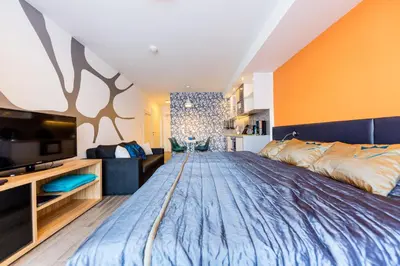 Ein Bett oder Betten in einem Zimmer der Unterkunft Sissi Park Haus im Ennstal - Schladming
