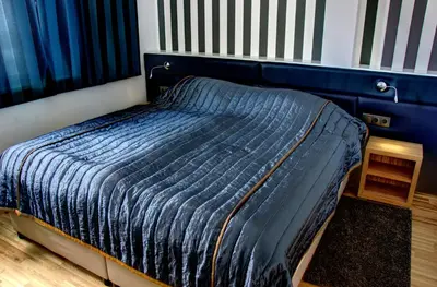 Ein Bett oder Betten in einem Zimmer der Unterkunft Sissi Park Haus im Ennstal - Schladming