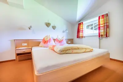 Ein Bett oder Betten in einem Zimmer der Unterkunft Wechslerhof