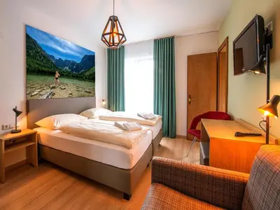 Ein Bett oder Betten in einem Zimmer der Unterkunft Schlafmeile Traunsee