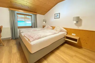 Ein Bett oder Betten in einem Zimmer der Unterkunft Apartment in Filzmoos near Ski Amadé