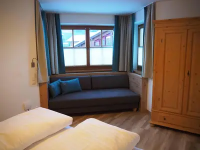 Ein Bett oder Betten in einem Zimmer der Unterkunft Haus Florian Appartements