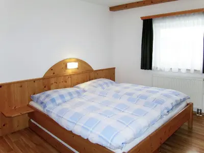 Ein Bett oder Betten in einem Zimmer der Unterkunft Apartment Margit by Interhome