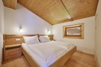 Ein Bett oder Betten in einem Zimmer der Unterkunft Landhaus Huber