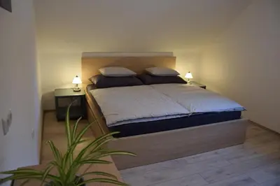 Ein Bett oder Betten in einem Zimmer der Unterkunft Ferienhaus Saxenauer