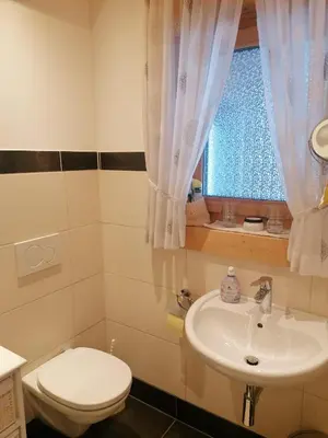 Ein Badezimmer in der Unterkunft Chalet Bergheimat